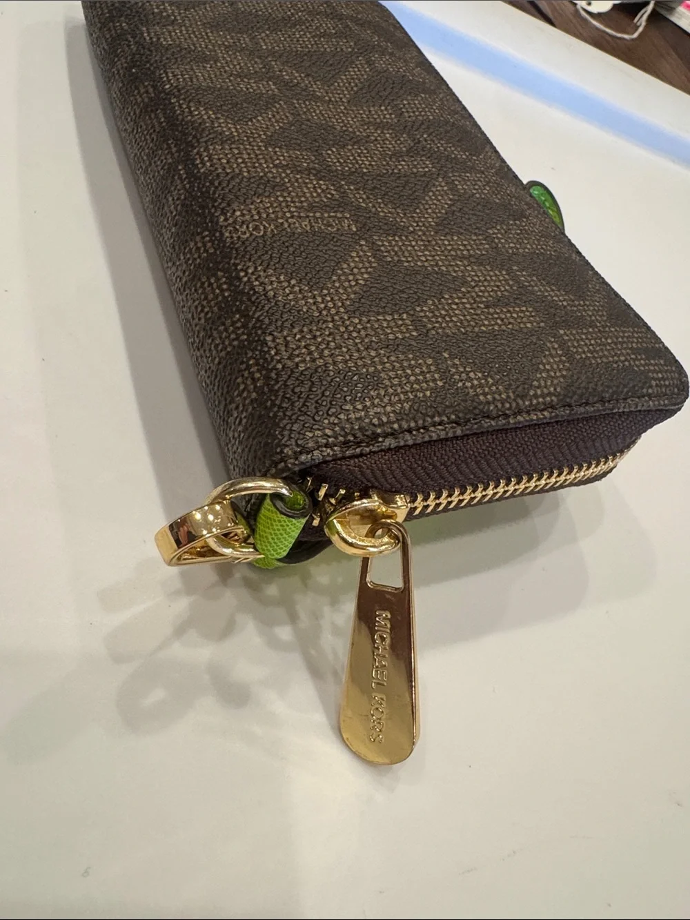 Michael Kors Brown Monogram Wristlet with Lime Accent